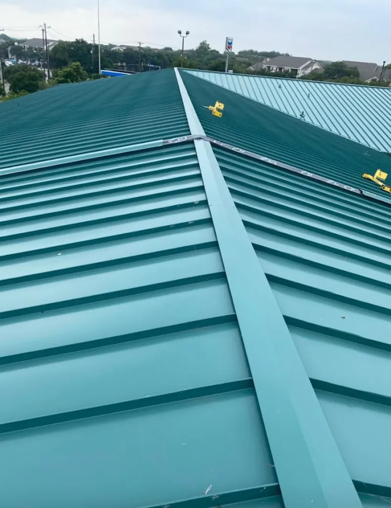 Green commercial metal roof ridge and valley for Metal Roof Repair in Elk River