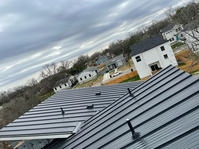 Standing seam metal roof panels with vents for Skylight Repair in Elk River